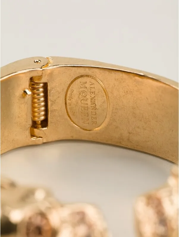 Alexander Mcqueen Women's Twin Skull Bracelet in Antique Gold